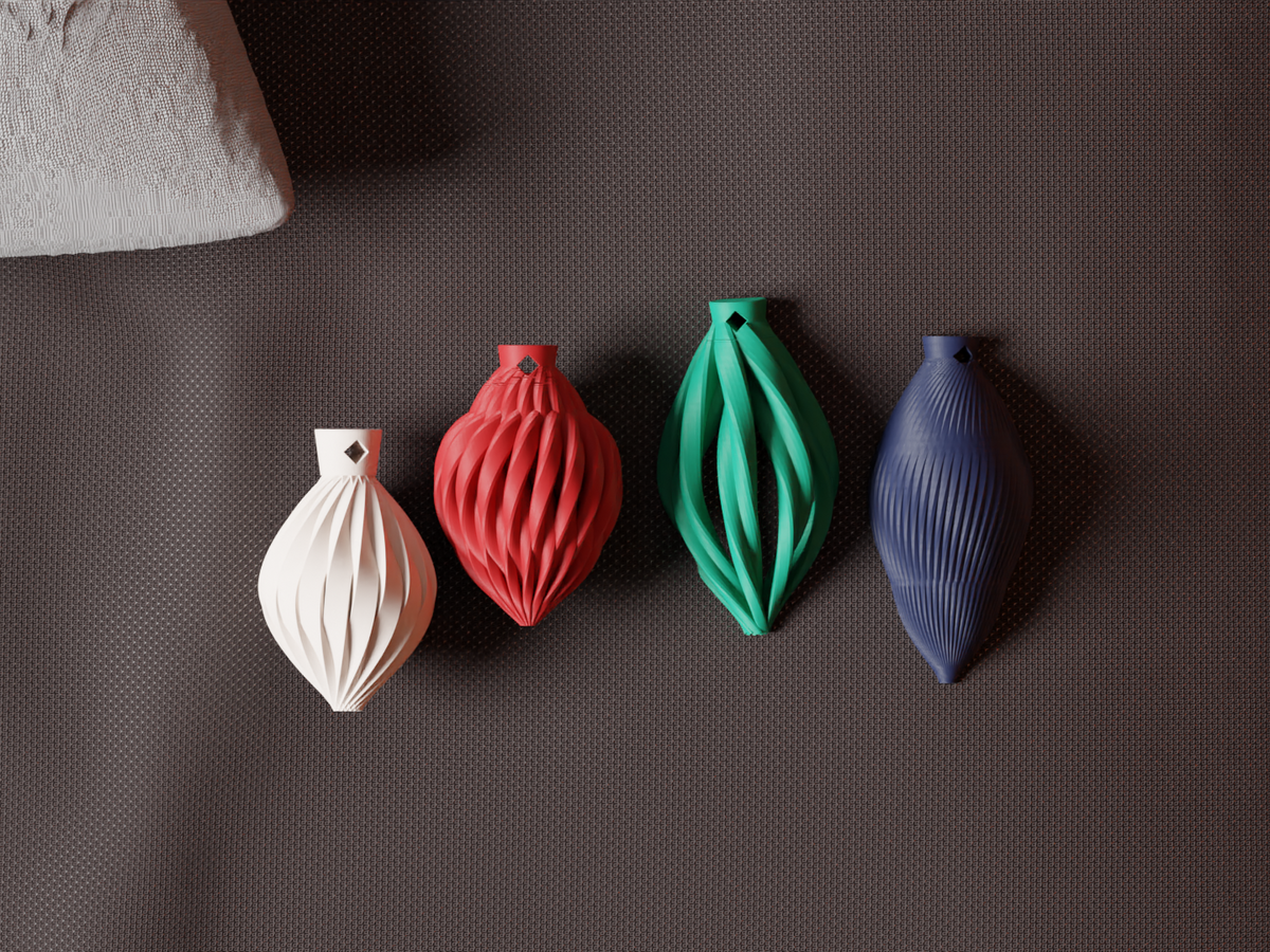 Four small ribbed Christmas bauble shapes side by side