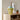 Floating wibble sphere table lamp, yellow stand and blue sphere shade on a wooden shelf
