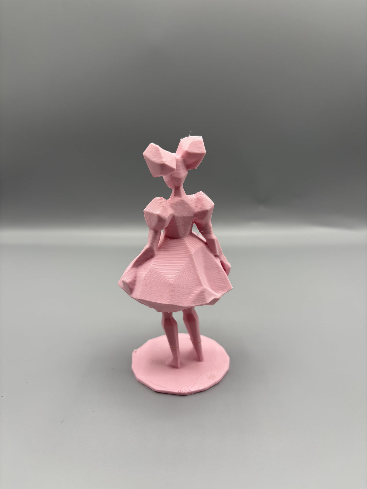 LOW-POLY PINK COUTURE FIGURINE SCULPTURE