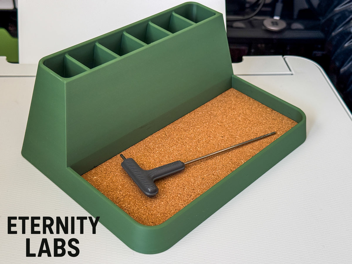 Large modern desk organizer with divided pen holder and open tray, angled view