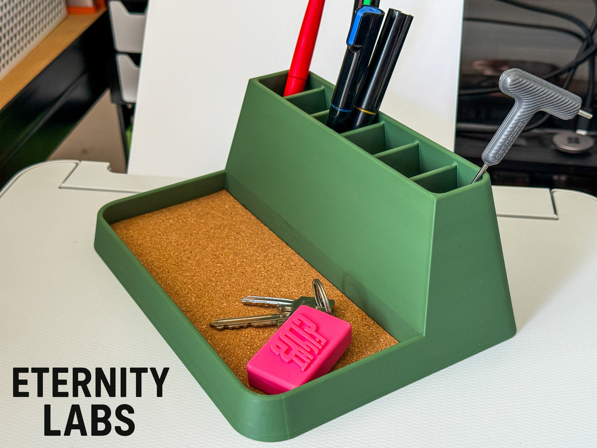 Large modern desk organizer holding pens and markers with keys in the tray