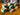 Staggered steps display stand with raised blocks at different heights